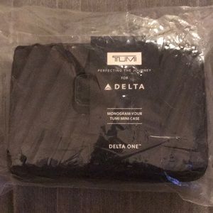 TUMI Black Toilet Case Monogram